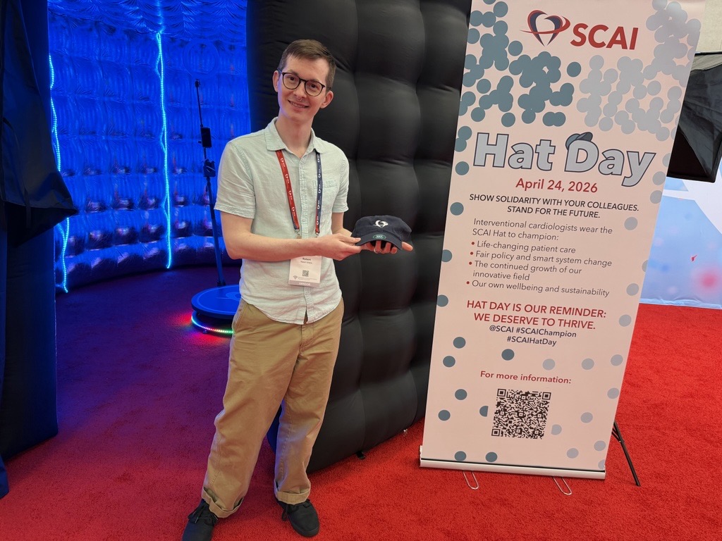 SCAI's tweet photo. Your #SCAIHatDay moment—captured 🎥🧢 Hit the SCAI Engagement Area for your #SCAIHatDay moment.
#SCAI2026 #InterventionalCardiology @MCoylewright @mirvatalasnag @chadialraies @Babar_Basir @Pooh_Velagapudi @DLBHATTMD @SrihariNaiduMD https://t.co/DHP10xptKJ