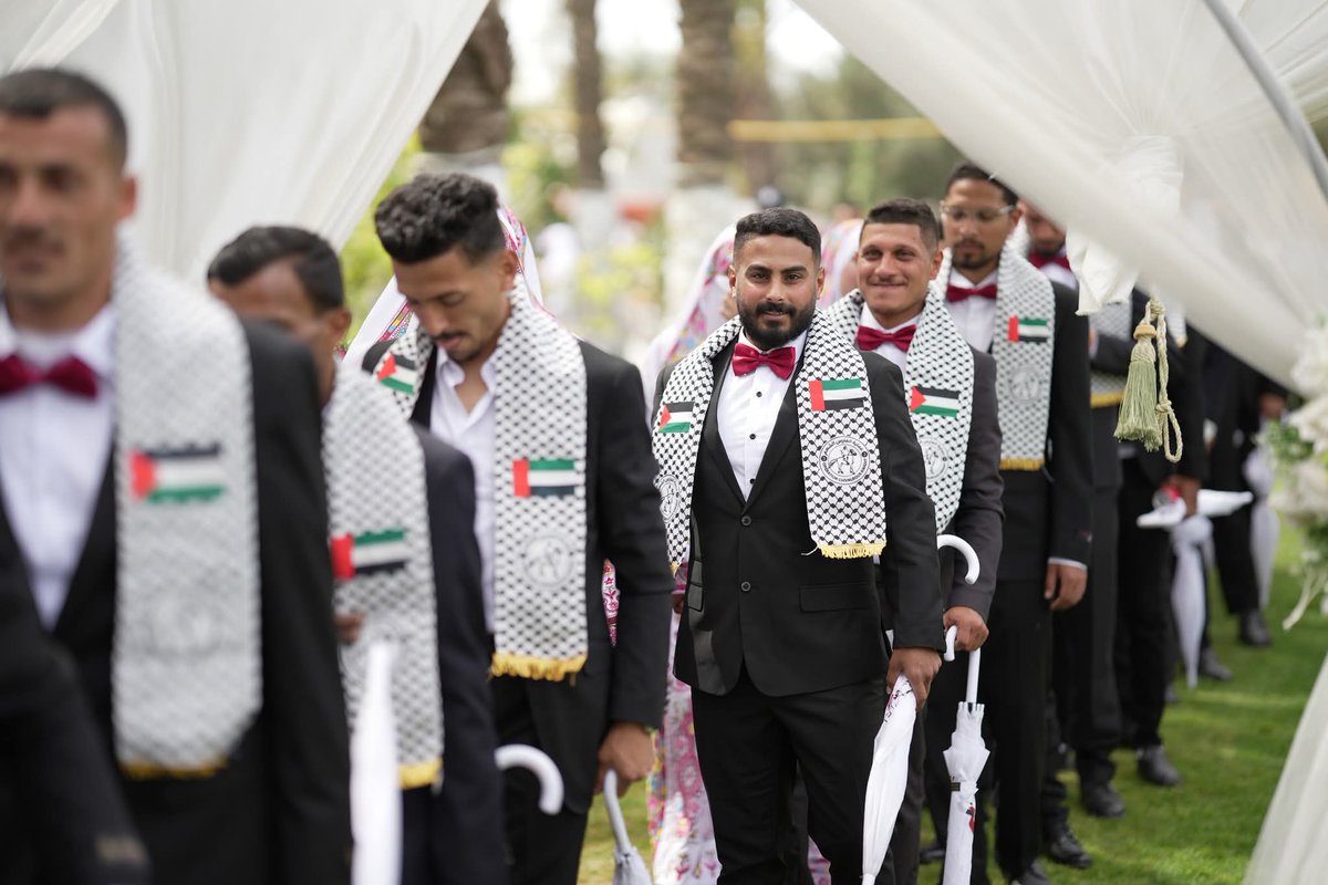 PalPress24's tweet image. "In an atmosphere filled with hope and joy, grooms began gathering in preparation for the launch of the mass wedding in #Gaza, supported by the Khalifa Humanitarian Foundation."