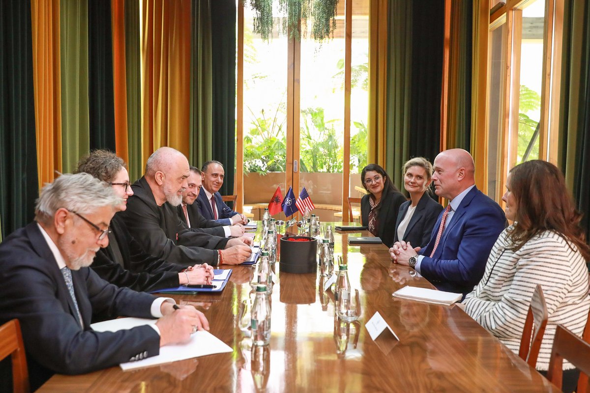USAmbNATO's tweet photo. In Albania, I had an informative flyover tour of the Kucova Air Base from Defense Minister Ermal Nufi. 🇦🇱 is increasingly capable in cyber defense, committed to the Board of Peace and International Stabilization Force in Gaza, and more. Discussing with Prime Minister Rama, and his team, I emphasized that we look forward to seeing what more can be achieved for military mobility once Albania meets President Trump’s 5% GDP defense spending goal.