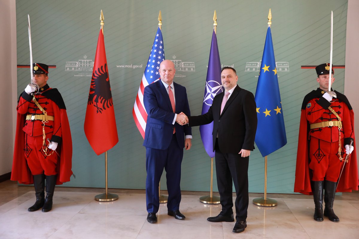 USAmbNATO's tweet photo. In Albania, I had an informative flyover tour of the Kucova Air Base from Defense Minister Ermal Nufi. 🇦🇱 is increasingly capable in cyber defense, committed to the Board of Peace and International Stabilization Force in Gaza, and more. Discussing with Prime Minister Rama, and his team, I emphasized that we look forward to seeing what more can be achieved for military mobility once Albania meets President Trump’s 5% GDP defense spending goal.