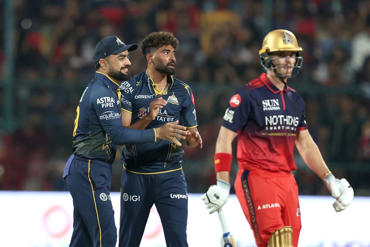 IPL's tweet image. First wicket for #GT ☝️

Mohd. Siraj sends back Jacob Bethell to fetch the first breakthrough 👊

Updates ▶️ bit.ly/TATAIPL-2026-34

#TATAIPL | #KhelBindaas | #RCBvGT