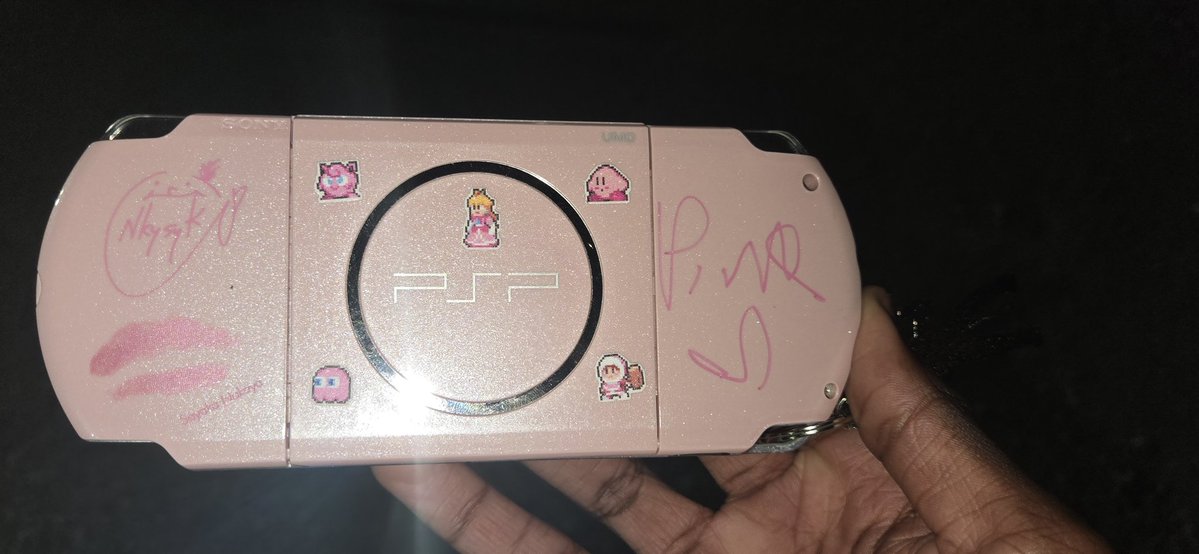 solarastar's tweet image. guess who got their psp signed by pinkpantheress 😁 #oneofone