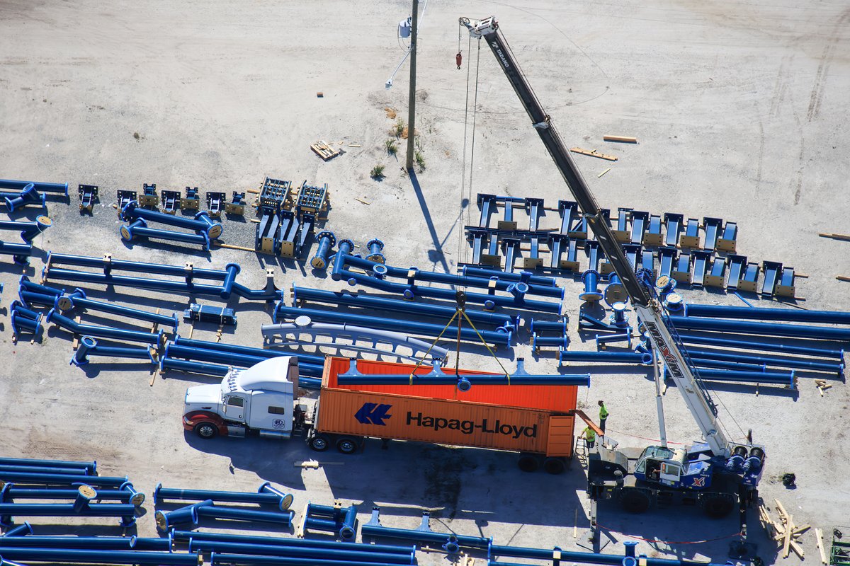 Aerial photo of a track support being unloaded in a staging yard for Fast &amp; Furious Hollywood Drift.