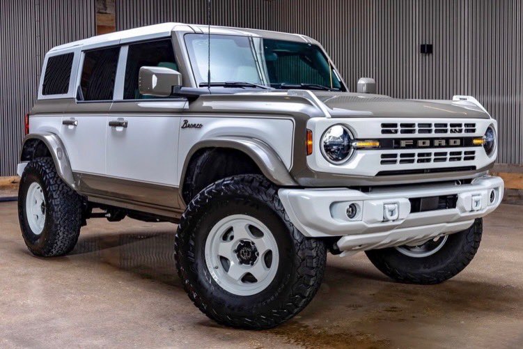 liftedtrucks's tweet image. Old school style, new school luxury. Our custom built #Retro Broncos are beautiful!! Like this 2026 4X4 at our #McKinney TX location with only 11 miles! Check out the interior on this one! Stock TX09205. Featuring custom Katskin leather interior, paint matched fender flares, hood