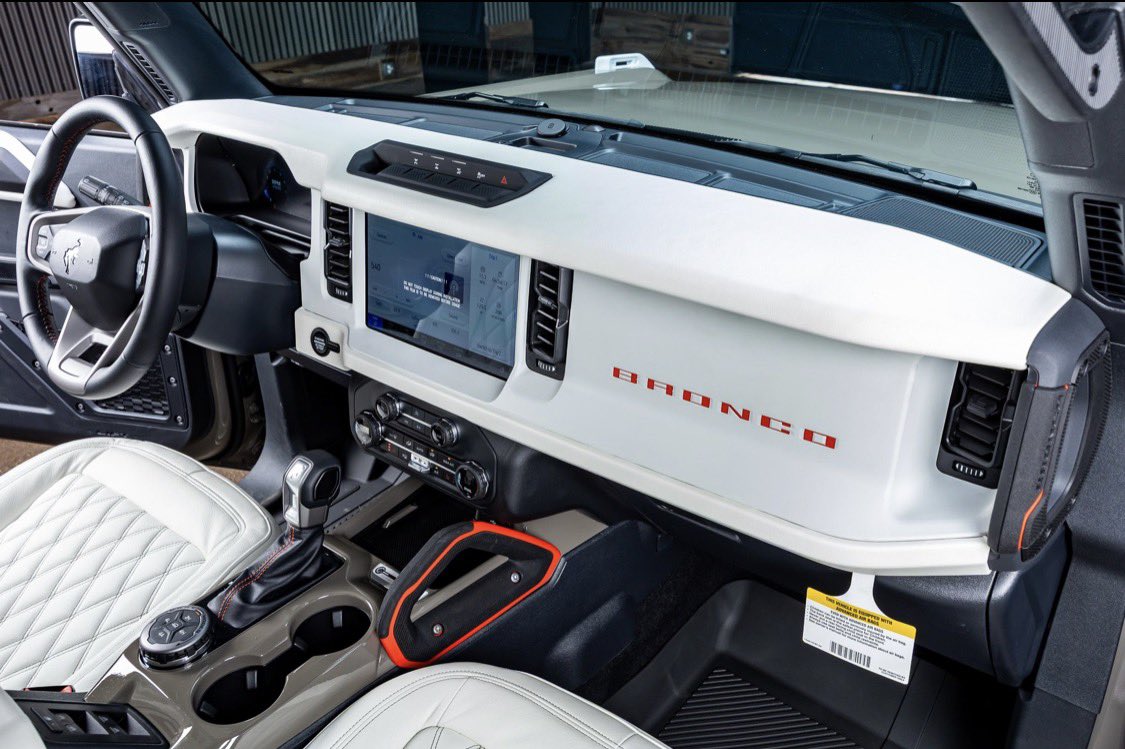 liftedtrucks's tweet image. Old school style, new school luxury. Our custom built #Retro Broncos are beautiful!! Like this 2026 4X4 at our #McKinney TX location with only 11 miles! Check out the interior on this one! Stock TX09205. Featuring custom Katskin leather interior, paint matched fender flares, hood