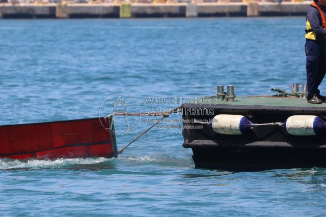 Shipguru's tweet image. #pilotboat #DELTA_I #towing #oilboom at #grandharbourmalta -19.04.2026 -  maltashipphotos.com - NO PHOTOS can be used or manipulated without our permission