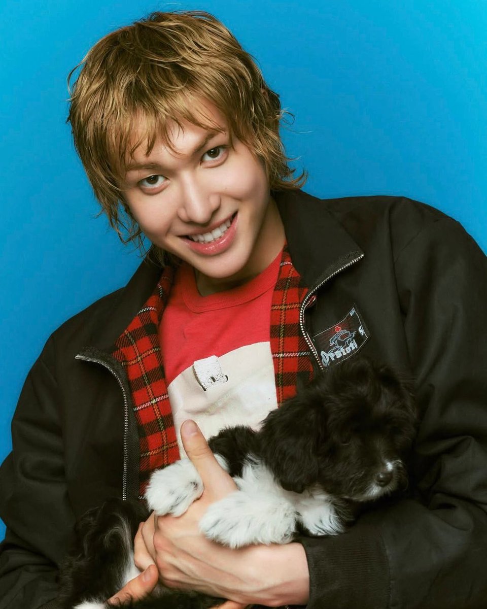 puppytin holding a puppy SO CUTE
