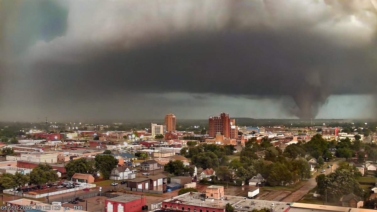 Incredible screen grab from the Enid Oklahoma tower camera of the violent tornado by Vance AF base, contrast enhanced
