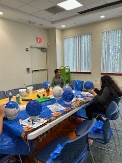 HKDPLibrary's tweet photo. Our patrons planted flowers at the Main Library and Village Branch, and made globes in many forms for Earth Day this week! We also had a plant swap organized by the Patron services department. We take great pride in being a certified sustainable library, especially on Earth Day! https://t.co/iyn9JMxWnf
