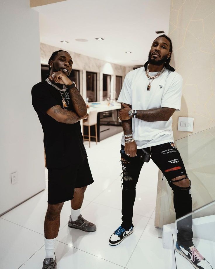 Burna boy and his senior brother.