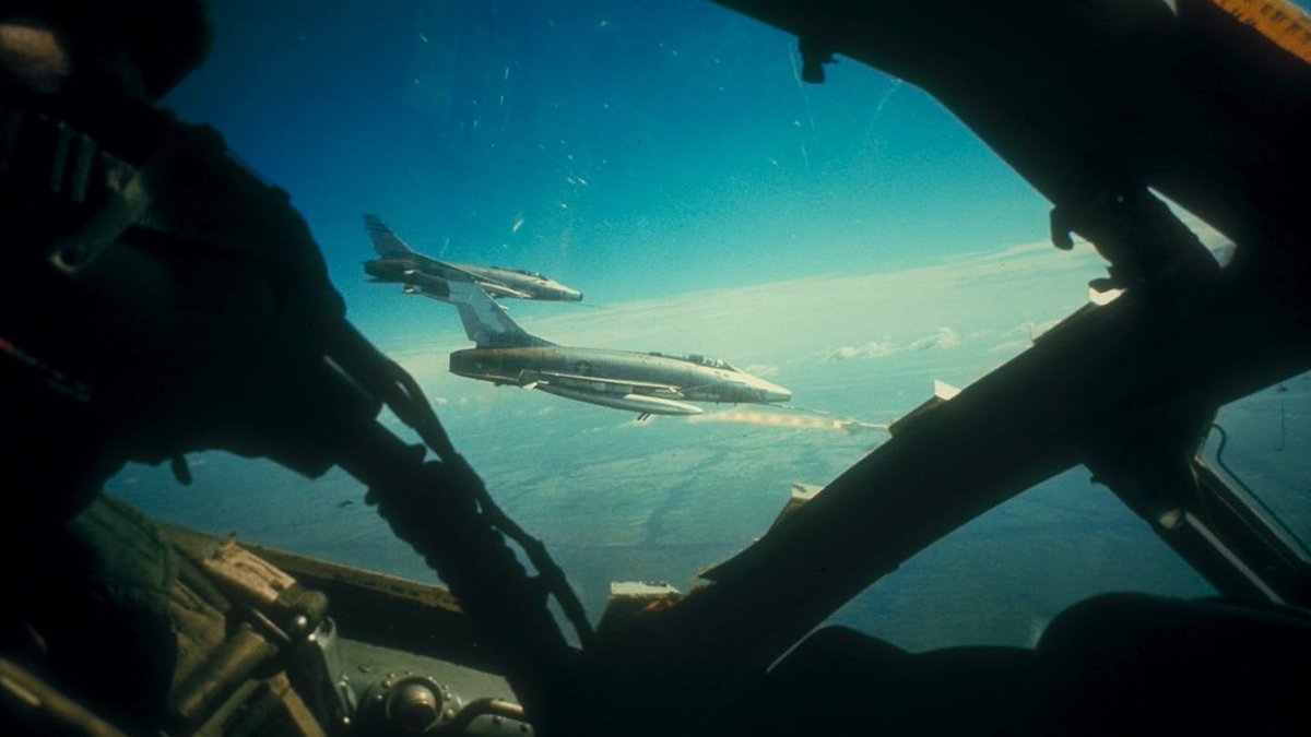 joeblillib4090's tweet photo. Pilot of an F-102A taking a photo of an F-100D Super Sabre firing an AGM-12 Bullpup onto a PAVN/VC Target. https://t.co/5ZC1mP8Sfs