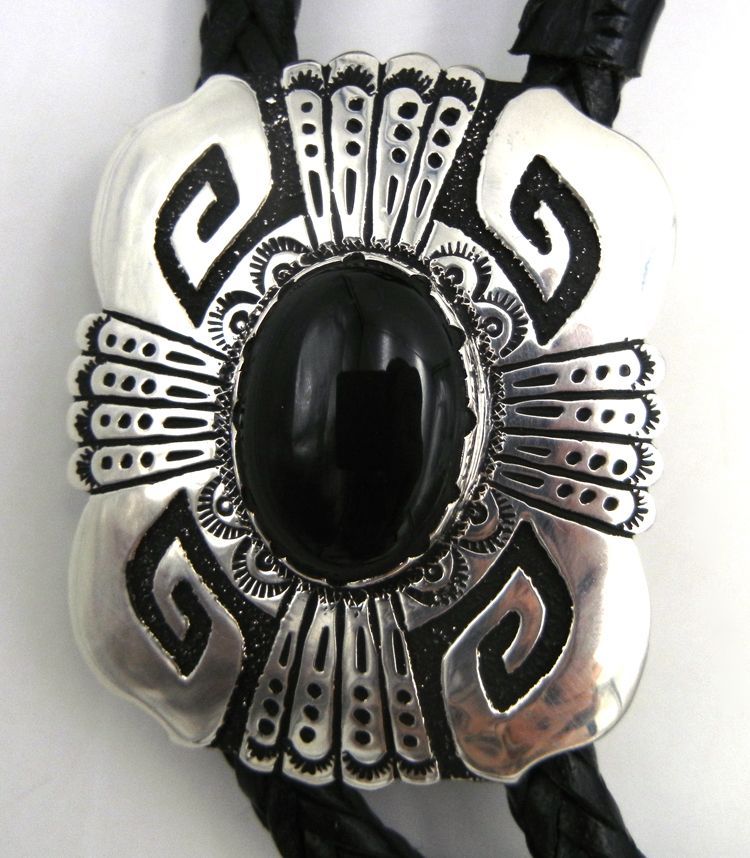 palmstrading's tweet image. The strength of the onyx gem lies in its power to give the wearer alignment and stabilization during troubled times. 

Bolo tie by #Navajo silversmith Rosita Singer.