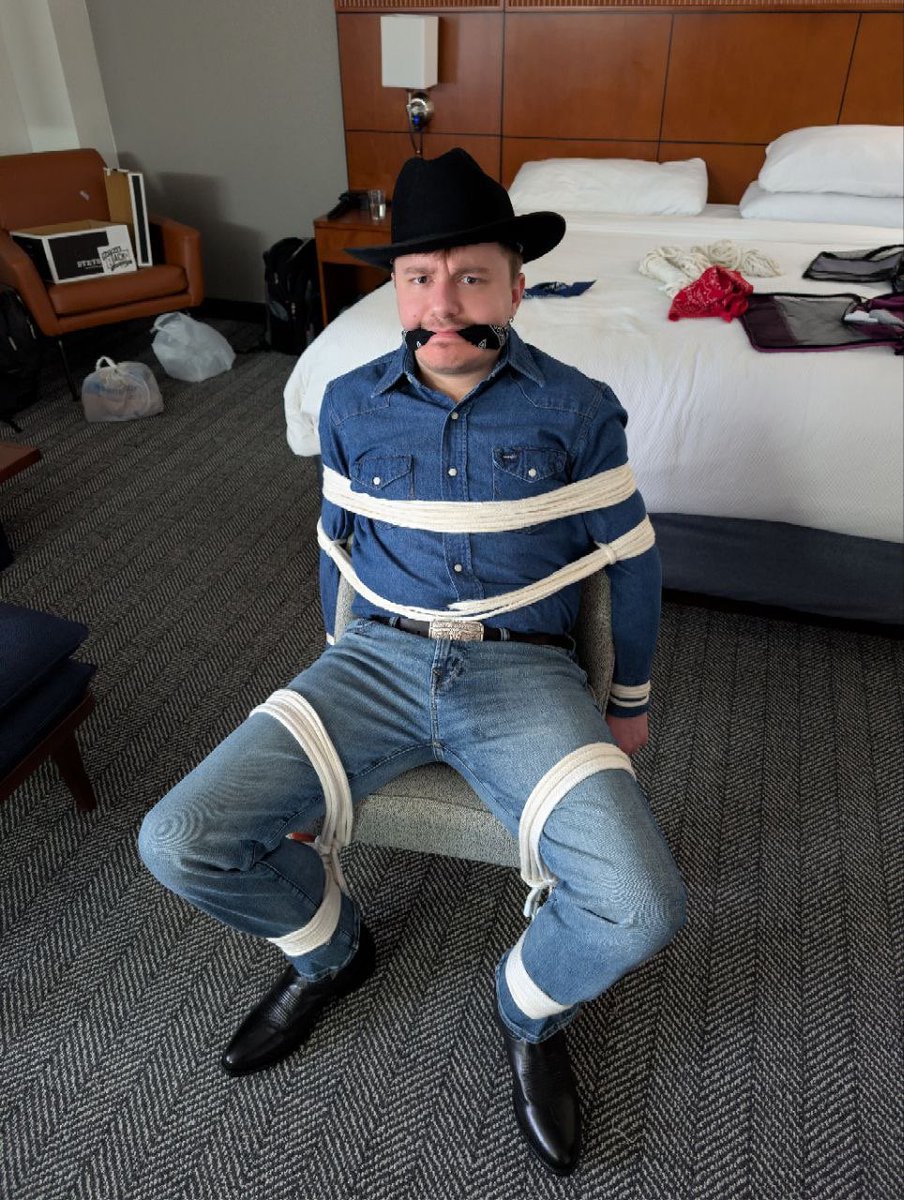 ColeinCaptivity's tweet photo. Had an excellent time with @CapturedCamo and @Tightywhitieluv a couple weeks ago! Decided to give the western look a try, and ended up in some western bondage! 😉🤠 https://t.co/YQm732n55Y