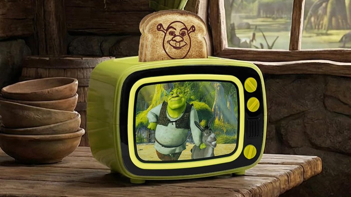 IGN's tweet image. The official Shrek retro TV toaster offers up a Shrekfast lifestyle on two pieces of bread. bit.ly/4sVgnye