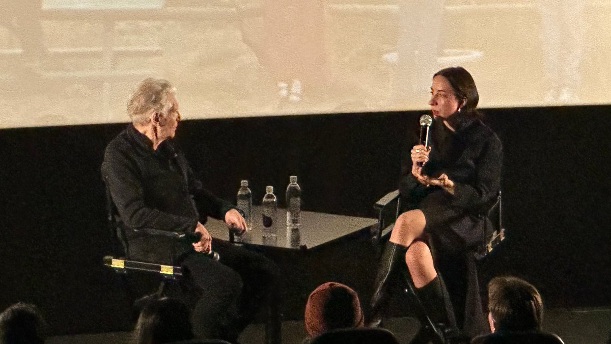CoreyAtad's tweet photo. here’s @SophyRomvari explaining filmmaking to David Cronenberg https://t.co/8uDmiJqRPv