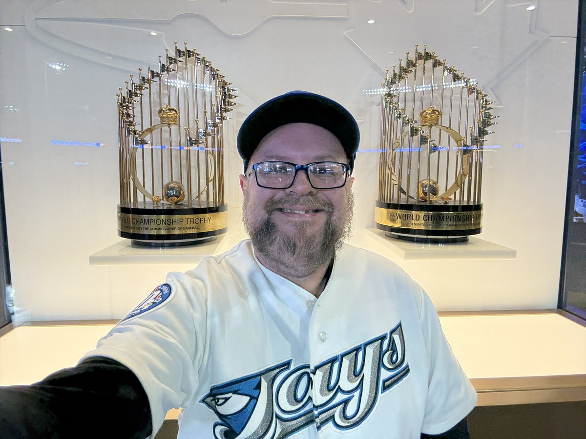sjgardin's tweet photo. So far the game has been kinda meh for the home 9 (getting better as I type), but 33 years on I’ve finally seen the 1992 and 1993 World Series Championship Trophies. Childhood dream accomplished. #Baseball #WhereWillYouBe #BlueJays50 @BlueJays #y2kNight https://t.co/xkkZYe6MHY