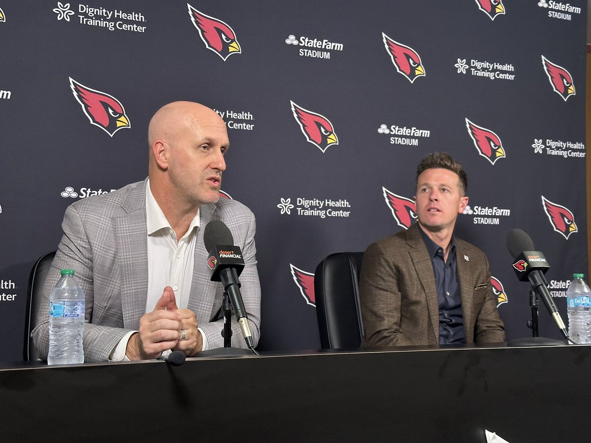 Cardschatter's tweet image. For #AZCardinals presser tonight, Monti Ossenfort and Mike LaFleur wearing “Coach Mac” pins in honor of the late Dave McGinnis.