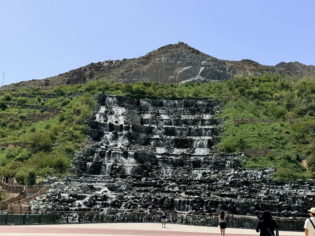 AsmaHaniffa's tweet image. The Khorfakkan Waterfall is a unique blend of engineering and nature, set against the Hajar Mountains. It shows how thoughtful design can transform a natural landscape into a vibrant, people-centered destination. 💚 #uae #dubai #unitedarabemirates #uae🇦🇪 #dubai🇦🇪