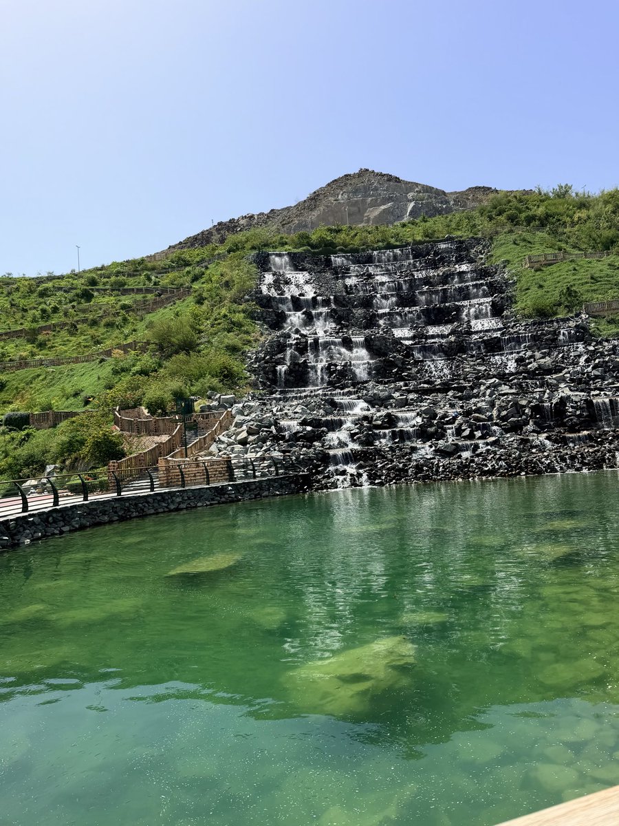 AsmaHaniffa's tweet image. The Khorfakkan Waterfall is a unique blend of engineering and nature, set against the Hajar Mountains. It shows how thoughtful design can transform a natural landscape into a vibrant, people-centered destination. 💚 #uae #dubai #unitedarabemirates #uae🇦🇪 #dubai🇦🇪