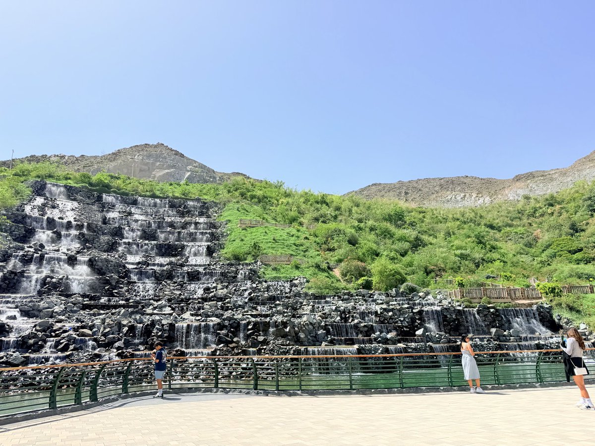 AsmaHaniffa's tweet image. The Khorfakkan Waterfall is a unique blend of engineering and nature, set against the Hajar Mountains. It shows how thoughtful design can transform a natural landscape into a vibrant, people-centered destination. 💚 #uae #dubai #unitedarabemirates #uae🇦🇪 #dubai🇦🇪