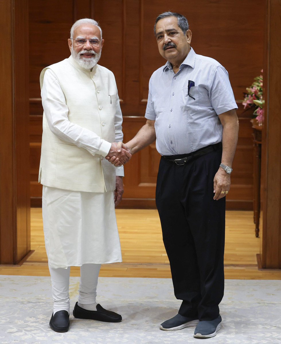Ashok Lahiri - The newly appointed Vice Chairman of Niti Aayog meets Prime Minister <a href="/narendramodi/">Narendra Modi</a> in New Delhi.