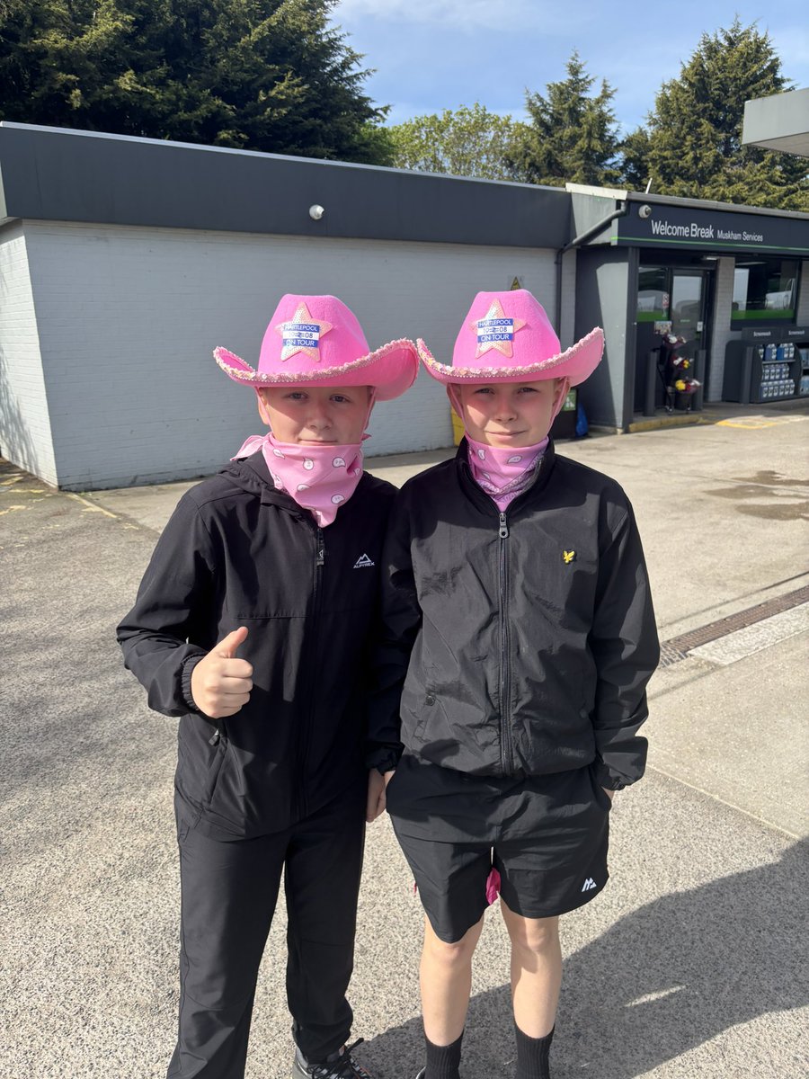 poolieneil's tweet photo. On route to Boston with these two cowboys… @Official_HUFC  #pinkday https://t.co/PezKsmM0Xh
