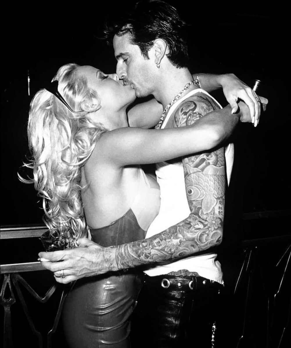 Pamela Anderson and Tommy Lee at the grand opening of the Hard Rock Hotel in Las Vegas (1995)