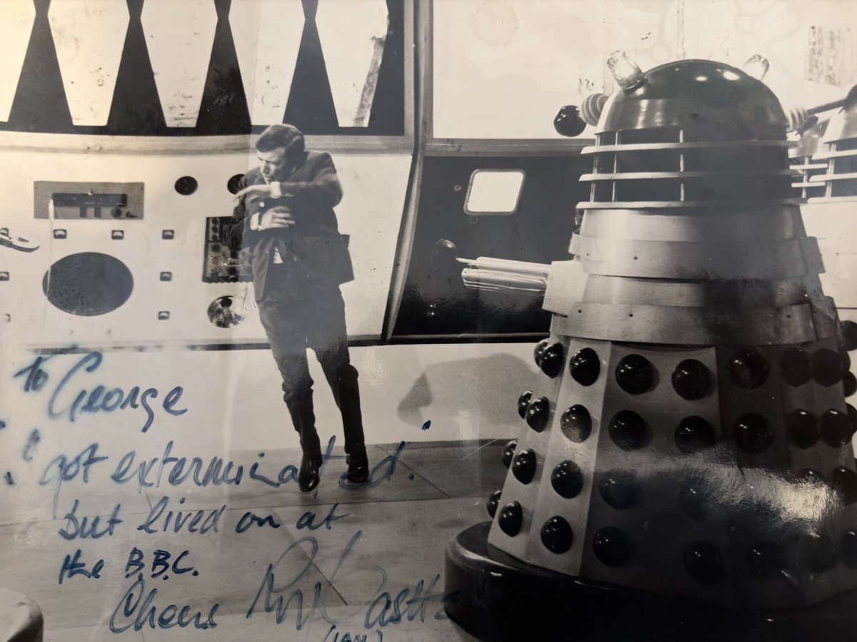 georgethefourth's tweet photo. In my first job back in the late 80s I had the pleasure of working with Roy Castle. So I couldn’t resist getting him to sign this Dalek movie print. Nice guy Roy, always making jokes. #Daleks #RoyCastle https://t.co/wmCeZn2Aox