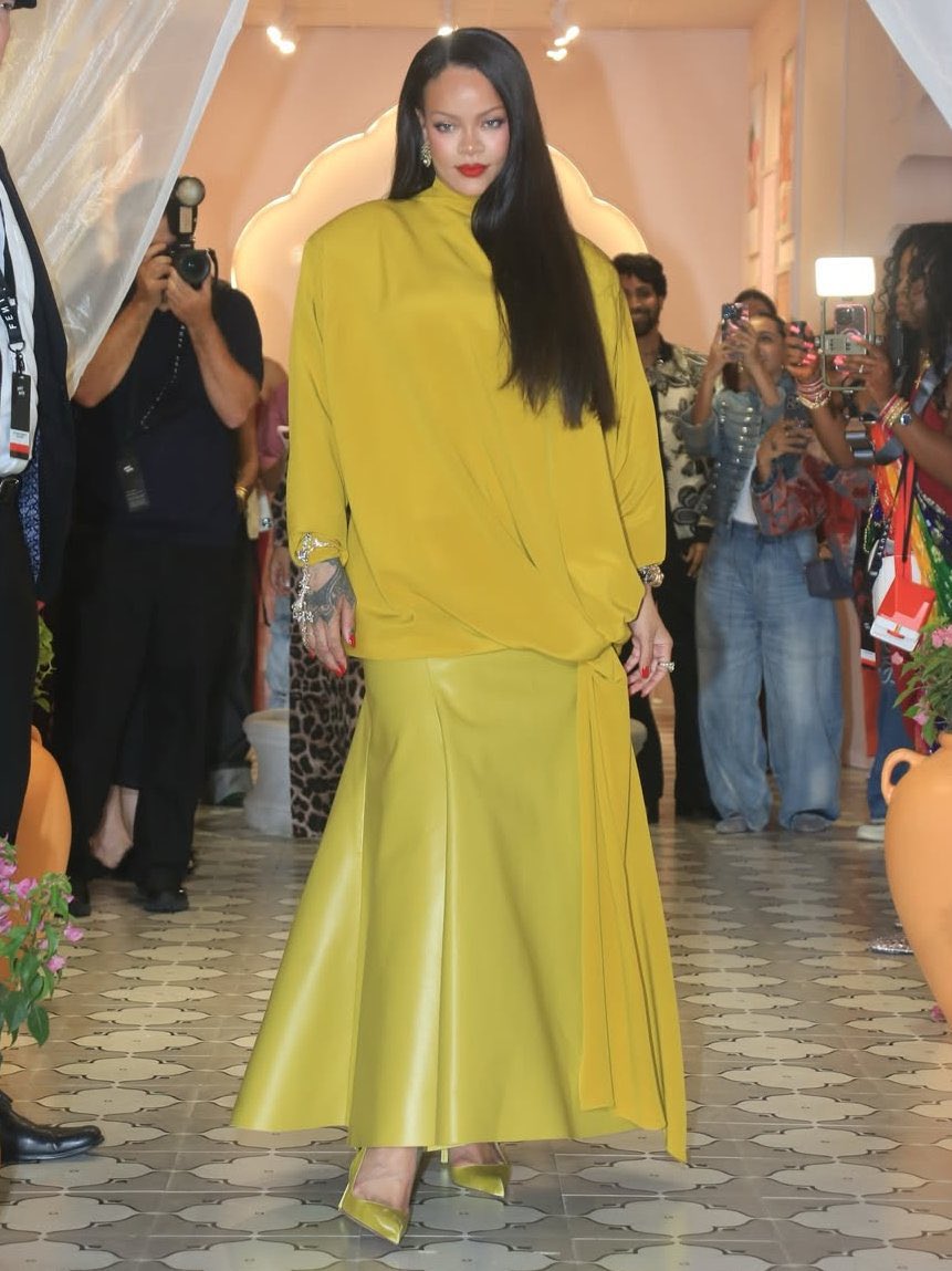 modexmagazines's tweet image. Rihanna wears a custom FW26 chartreuse fluid crepe cascade dress and leather mermaid skirt, to attend an event in Mumbai, India   #Mugler