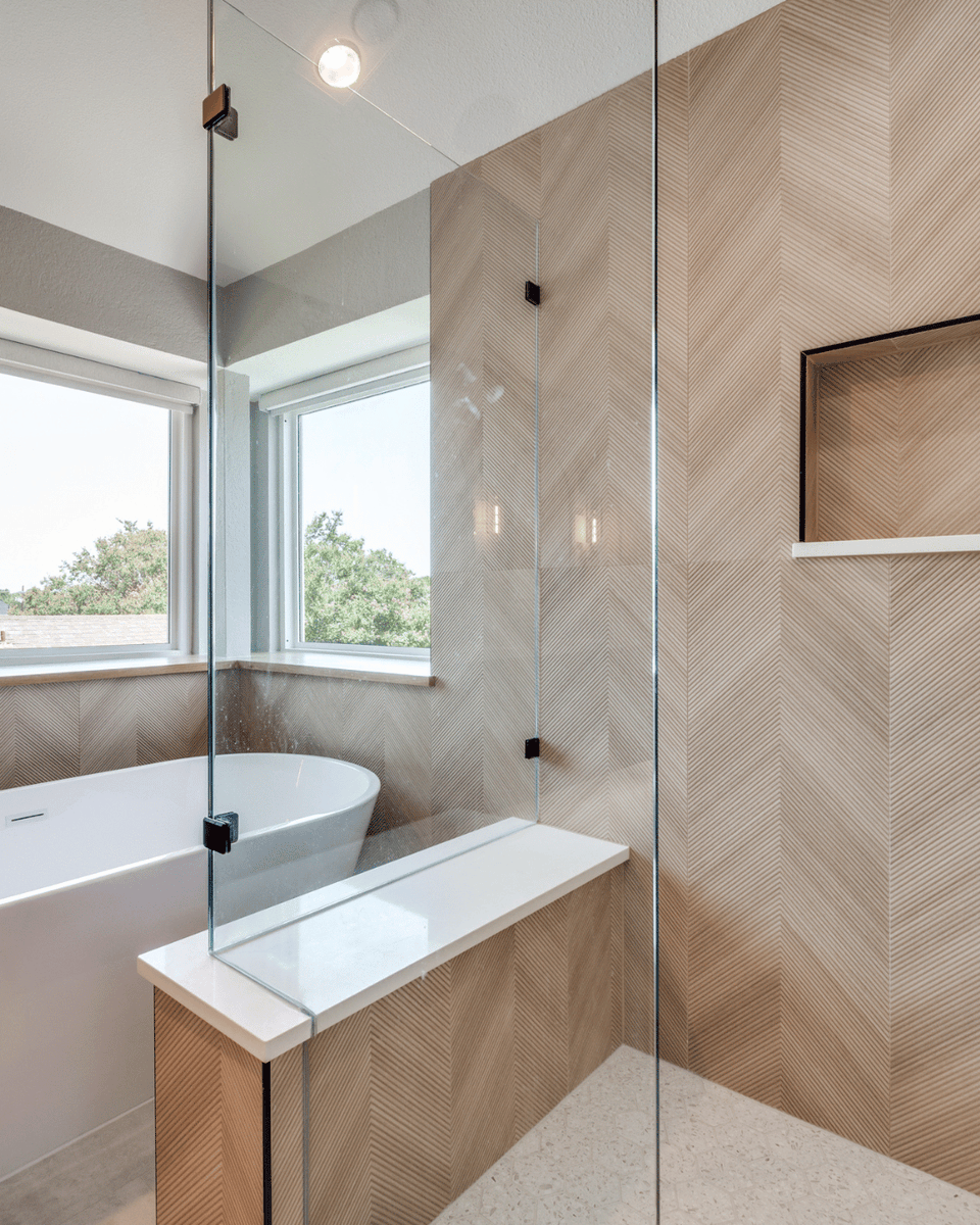 DFWImproved's tweet photo. Modern doesn’t have to feel cold. Pair warm wood tones with crisp tile for a bathroom that feels fresh and inviting. 

Browse the gallery for warm, spa-like inspiration: https://t.co/7vA06hH10v

#DFWImproved #HomeRemodeling #BathroomRemodel https://t.co/98zxH8JMbb