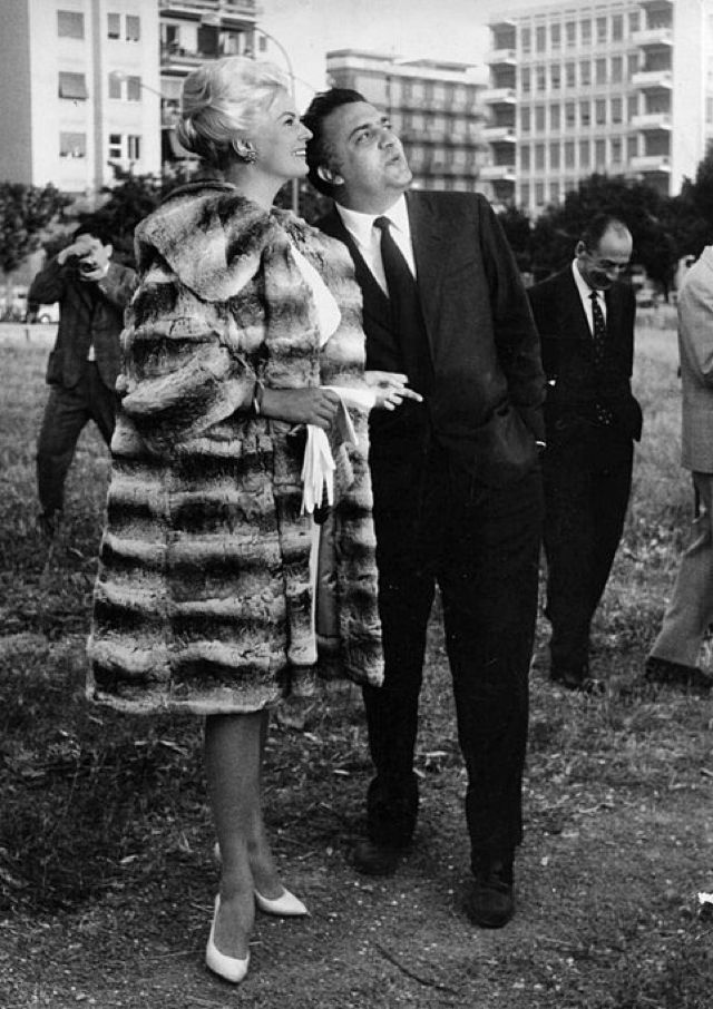 distractedfilm's tweet photo. Anita Ekberg towering like a glamorous polar bear while Fellini gazes into the future....

cu https://t.co/PxFMTetjg1