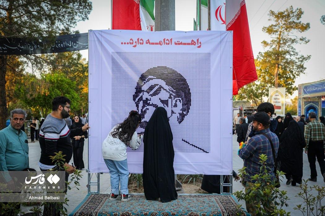 Iranians completed a portrait of the martyred Leader of the Islamic Revolution Ayatollah Seyed Ali Khamenei at Tehran's Behesht Zahra Cemetery.