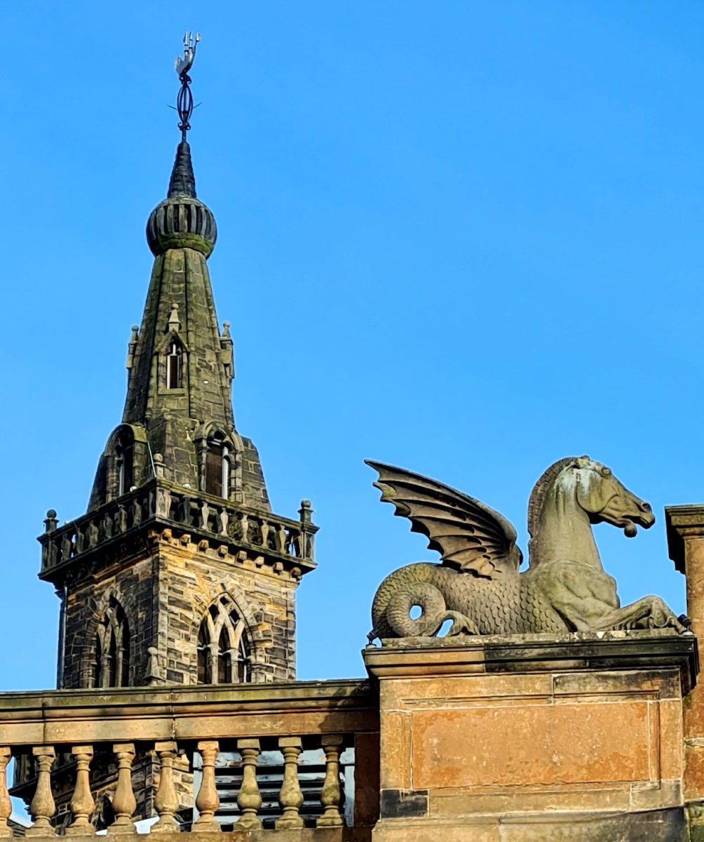 is_glasgow's tweet image. One of the Briggait's Winged Sea Horses or Hippocampi, dating from 1873, with the Merchants Steeple, dating from 1665, as seen from Clyde Street in central Glasgow.

#glasgow #architecture #sculpture #briggait #hippocampus