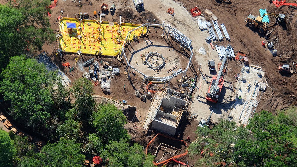 Aerial photos of construction of a carousel in Tropical Americas.
Yellow waterproof barrier placed for next concrete floor pour.