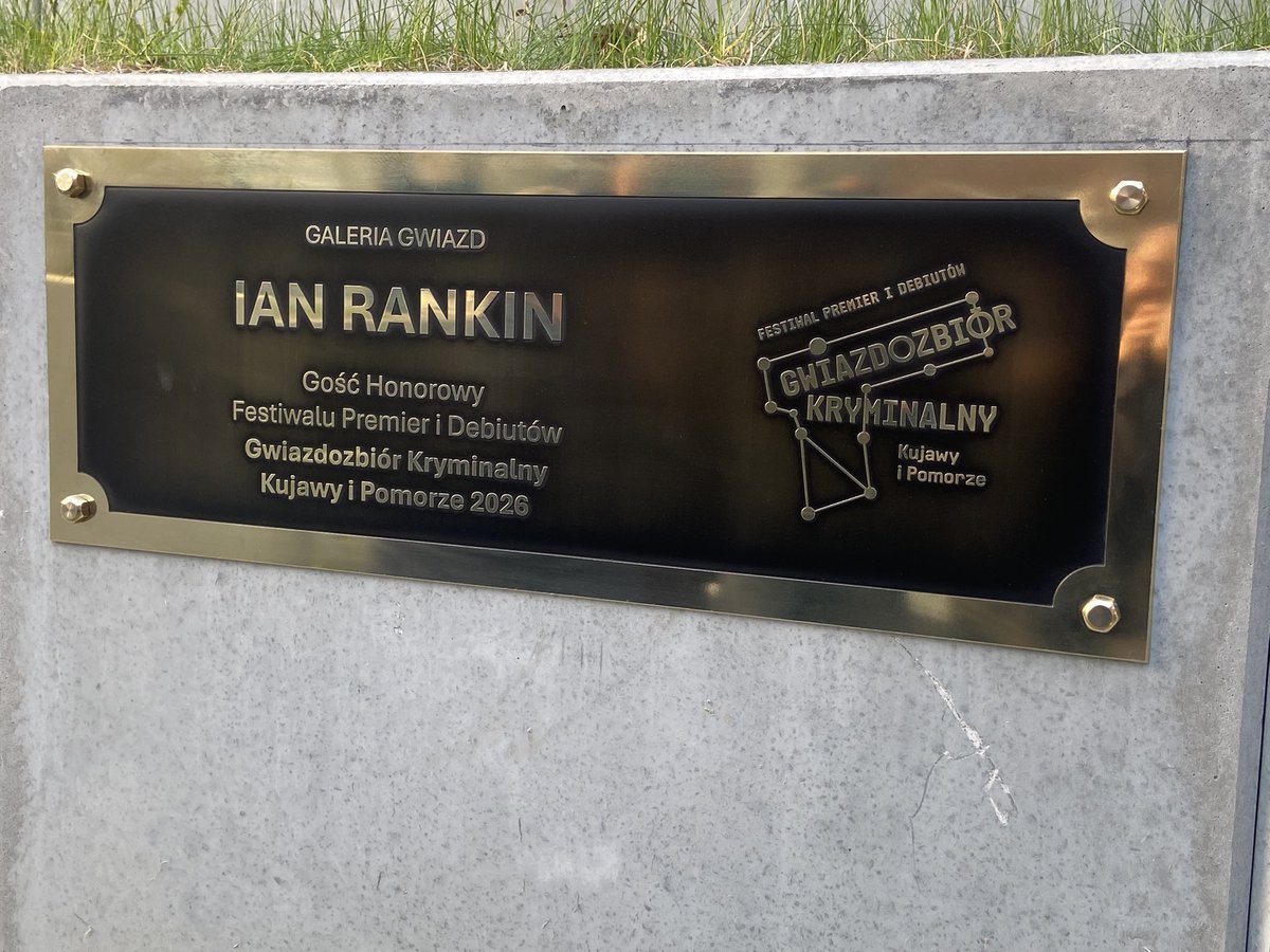 Beathhigh's tweet image. Well, this was nice. I am now a plaque outside the public library in Torun. All this and beer and gingerbread too…!
