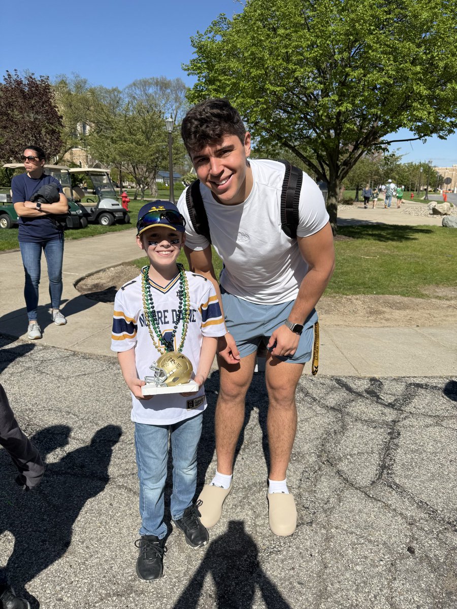 ShamRockedND's tweet photo. This is why Blue-Gold is so awesome. The memories made with my family and seeing his eyes light up seeing his hero’s in person. Thank you @NDFootball for making another great trip in our family tradition. https://t.co/nA0upWoIwg