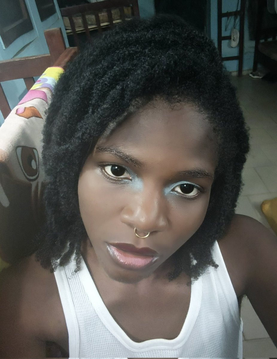ThisIsHair_py's tweet photo. "Natural hair, bold eyes, zero apologies. Just me and my coils doing their thing. 
#NaturalHair + #Naijabeauty https://t.co/IuG1CRpm5w