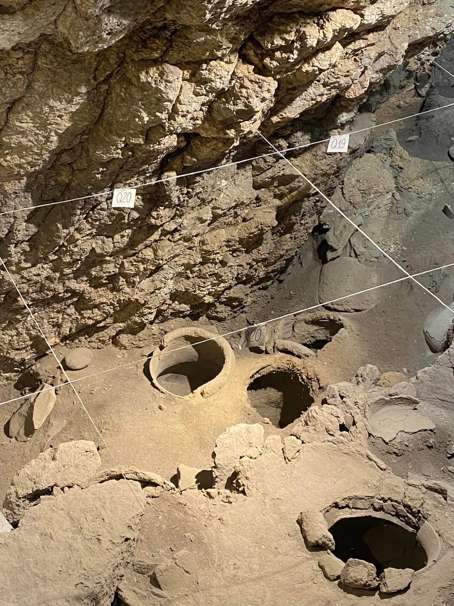 noricd's tweet photo. Photo of the Areni-1 cave complex, focused on those sunken old clay wine vessels in which the crushed wine rested 6,000 year ago. Read more https://t.co/p2hbKpbu4V. Photo credit: Andrew Drummond, 2024. Vahe states in the video wine history is now researched to back 11,000 years. https://t.co/Xeh3PQv1lq