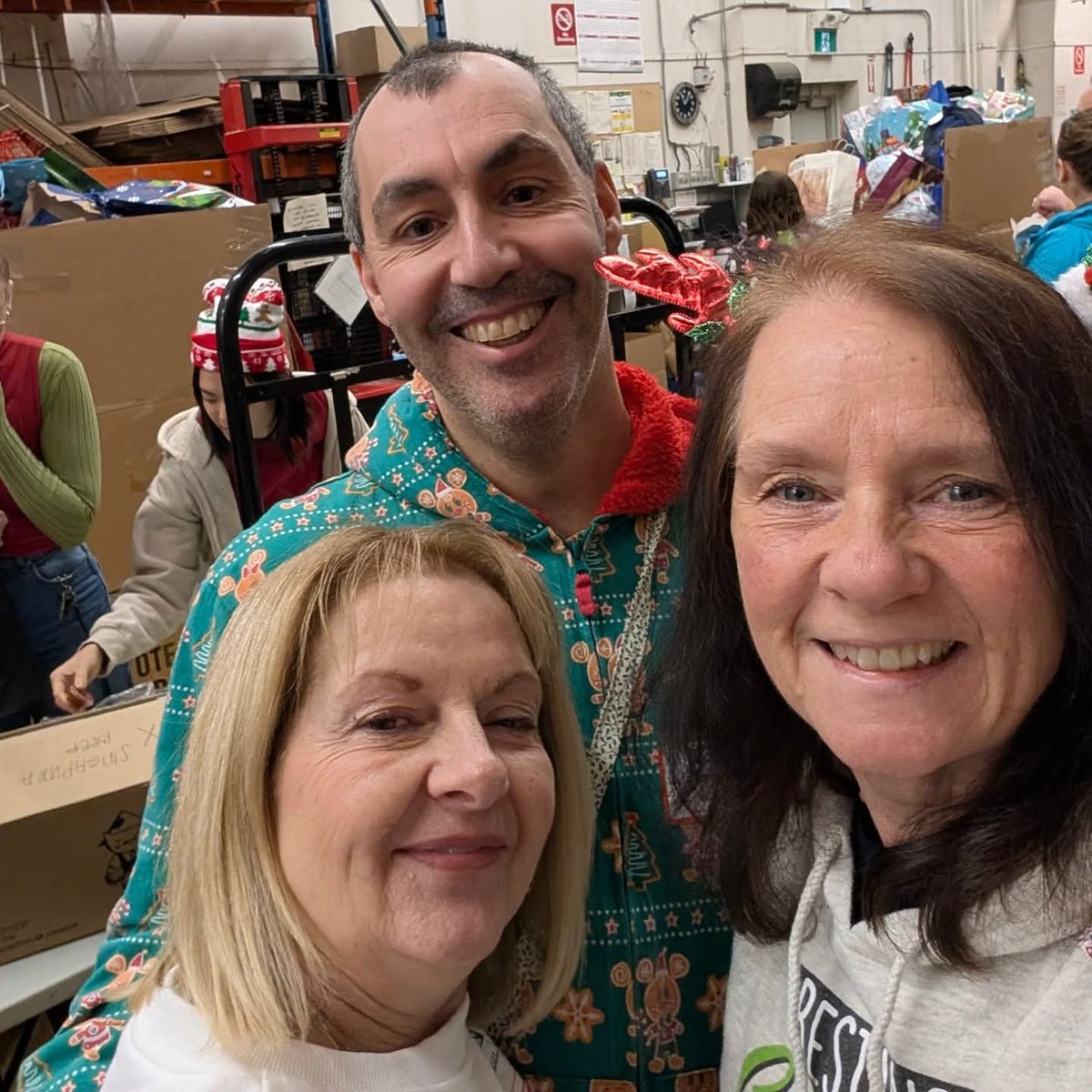 Jimmytheintern's tweet photo. Wrapping Day 2025!!! #stockingstuffersforseniors #ilovemyjob https://t.co/7GtWc2q7IM