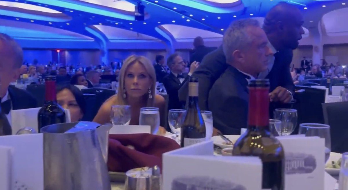 It’s amazing how RFK Junior is protecting his wife, isn’t it? Such a comforting, nurturing person. But seriously, he can’t even bother to turn in her direction?