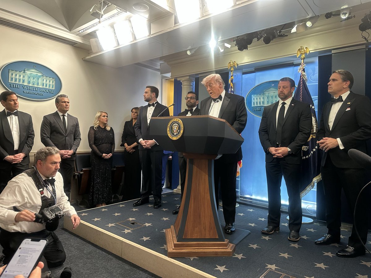 President Trump appears with most of his Cabinet and the First Lady.