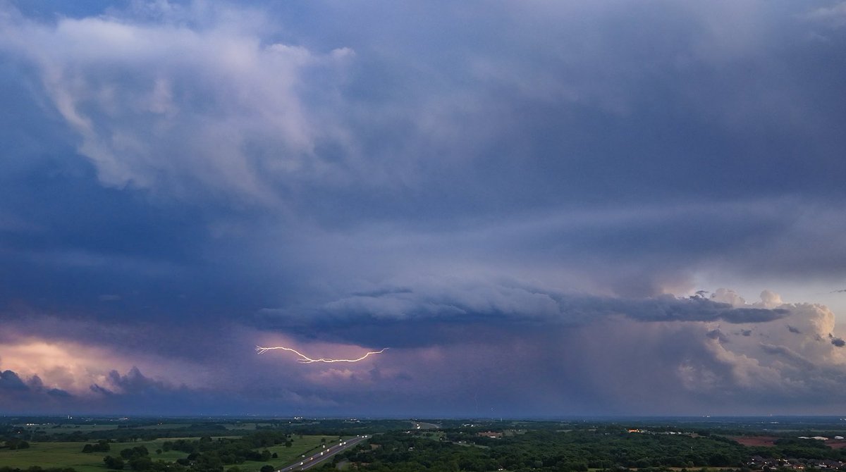 stevejkfor's tweet image. Screen grabs from live drone video. I was speeding back to the station, so the quality isn’t the best ..showing the storms in Garvin and Cleveland counties. 
#OKWX #Lightning #Storms