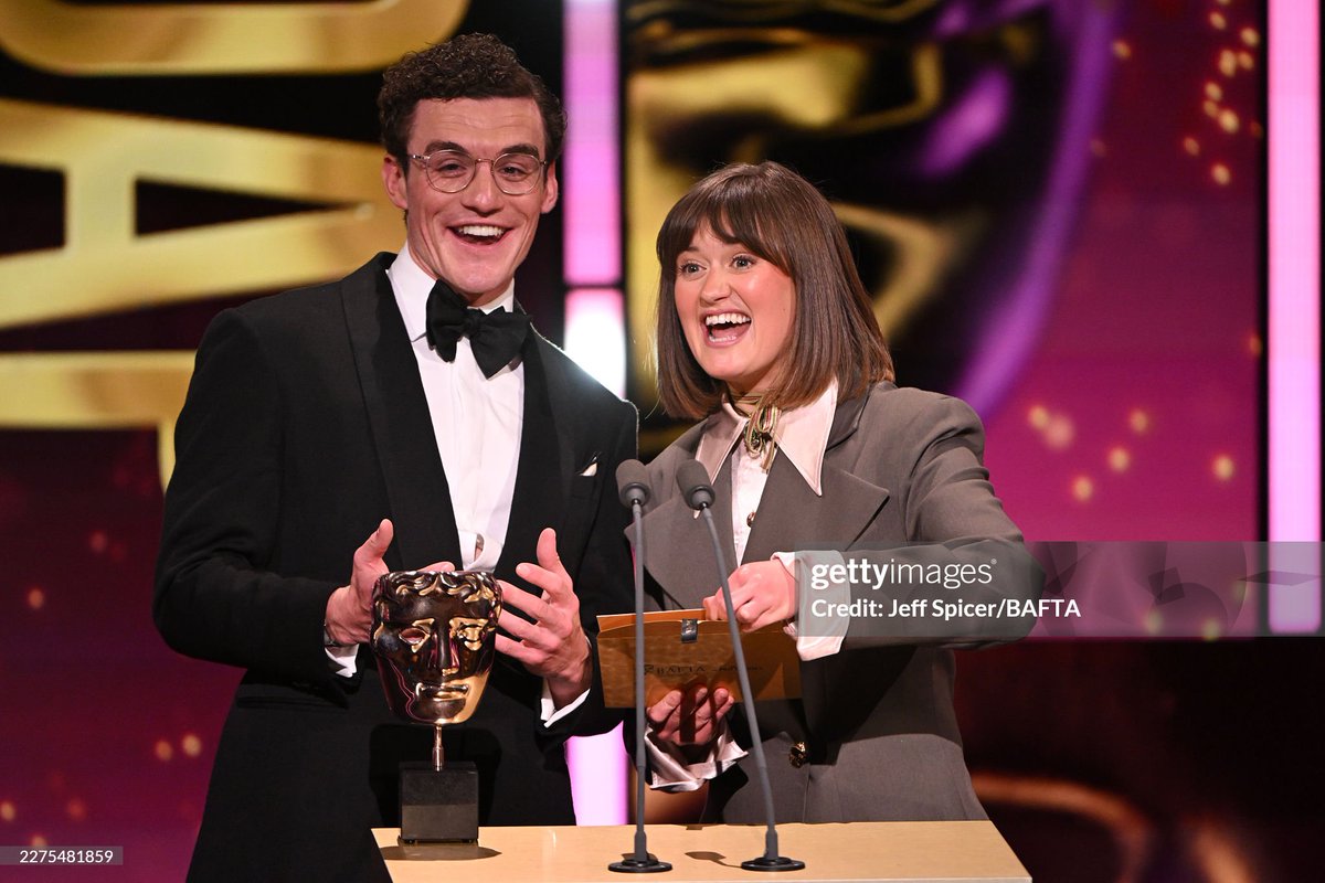 BritActorsFan's tweet photo. Donal Finn and Ella Bruccoleri present the Soap Award onstage during the 2026 BAFTA Television Awards https://t.co/ipwyKVPjUZ