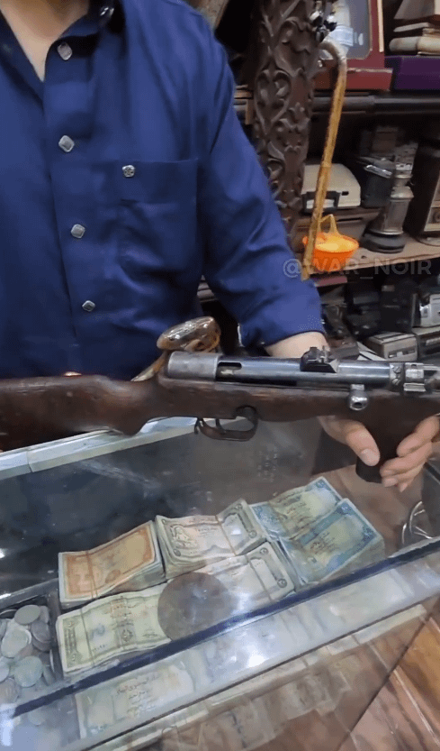 Elqueso982's tweet photo. A Yemeni antique objects dealer showing an Erma EMP submachine gun apparently rechambered in 7.62x25 Tokarev. https://t.co/NvVgw1JFXL