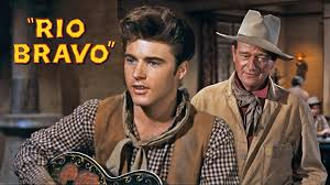 Fcsnva's tweet photo. Happy birthday wishes to #RickyNelson (BOTD 1940) wherever he may be. Some say he is the weak link in RIO BRAVO, but they are dead wrong, he holds his own with a cast of pros, and when they sing "My rifle, My Pony, and Me," it is pure magic. That's how he should be remembered. https://t.co/rZAEBBG0Ax