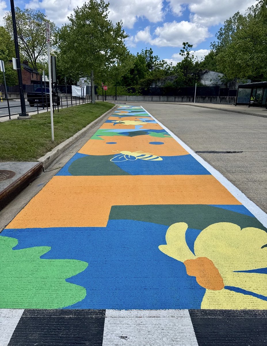 wmata's tweet photo. College Park-U of Md is a vibe! 🎨

@UofMaryland students &amp; Metro's Art in Transit made this 200-foot mural happen! It reflects many paths that connect the community to College Park every day. Great work! 

Special thanks to our Energy &amp; Environment &amp; Station Planning teams! https://t.co/09UTlkv1nD