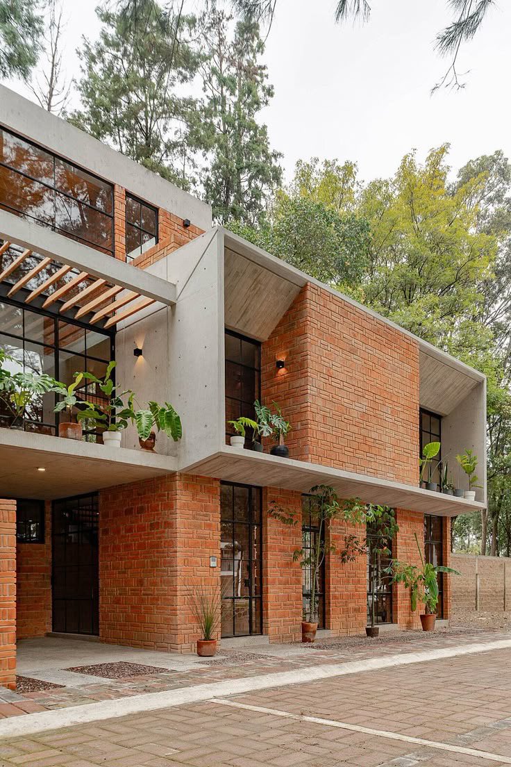 OyinAjibade's tweet photo. Most Nigerian homes look expensive but are badly designed bcos they are designed to impress visitors for 10 like minutes… not to make everyday life feel good for 10 years. 

You’ll see 
Giant buildings with poor ventilation
Massive compounds with no usable outdoor space
Fancy ceilings but terrible natural lighting
Marble everywhere but awkward circulation
Huge windows placed with zero consideration for heat gain. 
5-bedroom houses where half the rooms barely get used.

But good design asks:
“How does this space actually make people feel?”

Before air conditioners, architecture itself was the cooling system.
Thick earth walls. Courtyards. Deep overhangs. Cross ventilation.
A lot of traditional African homes were more climate-intelligent than many modern mansions today. Thankfully Modern architecture is slowly rediscovering these ideas.
