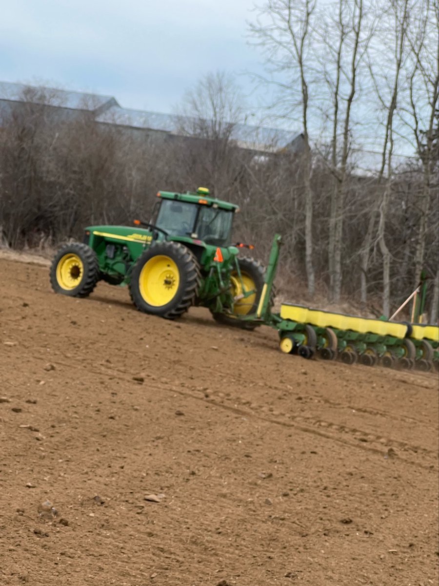 BernieKamphof's tweet photo. Been a cold and cloudy not-quite-spring.  Snowbanks and drifts still hanging on in many places. 
Today we checked one small field that slopes to the south and surprisingly had dried enough to stir up some dirt and bury some corn seeds! #Plant2026 https://t.co/guxbgInlnF