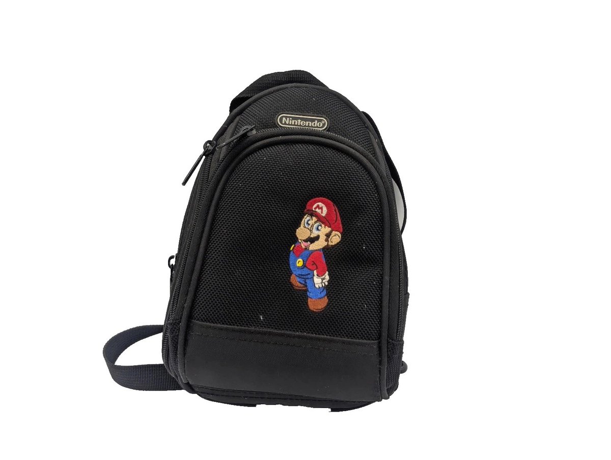 naebowski's tweet photo. @f4micom Completely unrelated, but I'm scrolling ebay right now and I've found just the perfect bag for you! However something's missing 🤔 https://t.co/YFk2D2dAPo