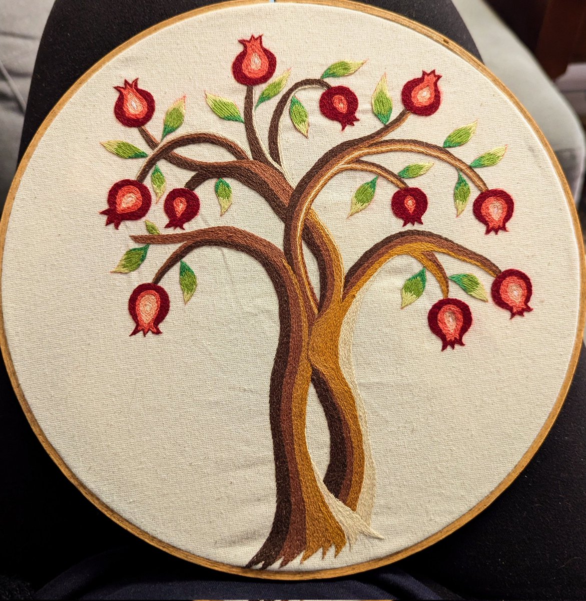 A few minutes ago I put the last stitch in the last pomegranate